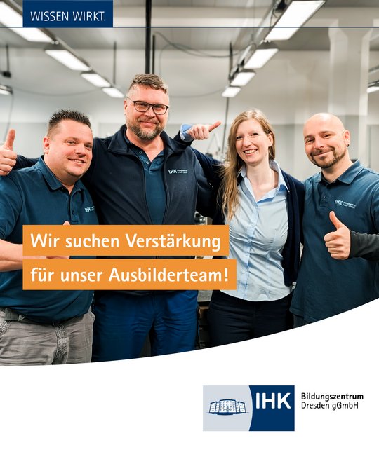 Four smiling individuals stand together in a workshop setting, promoting a message seeking new members for their training team. They appear friendly and engaged, with two giving thumbs up. The text emphasizes the need for reinforcement in their educational division.